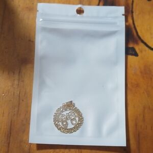 Gold Pendant with Intricate Design